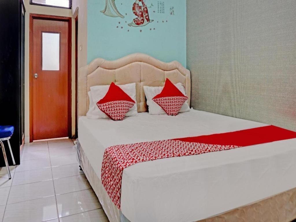 Oyo 90489 Kejora Homestay Jakarta Buitenkant foto